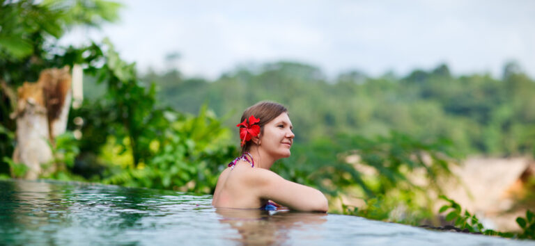 Woman relaxing at swimming pool