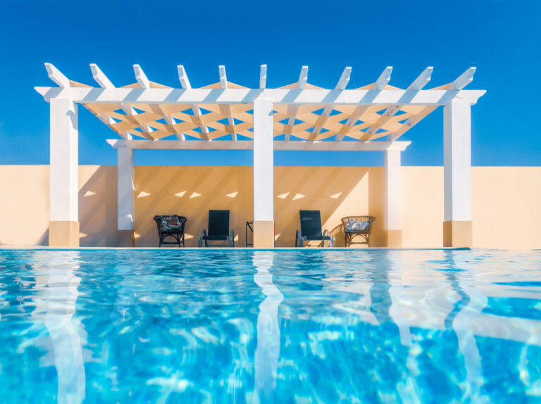 White poolside pergola, gazebo