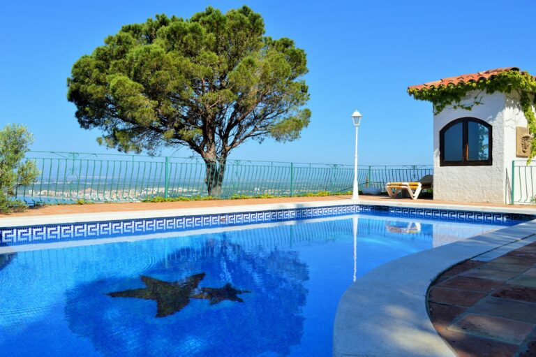 Green Leafed Tree Near Swimming Pool